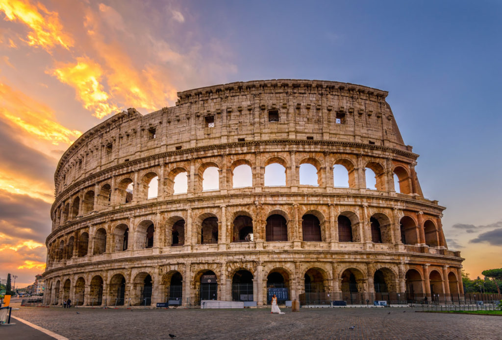 A view of the Colosseum at dusk.