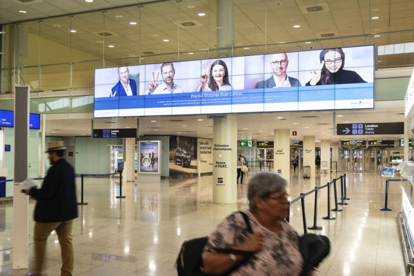 Barcelona airport advertising at T1 arrival.